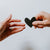 Hands with heart to represent using tools to change negative core beliefs