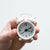 Small clock in hand for time management tools to reduce stress